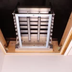 closed-view-of-dolle-alufix-concertina-loft-ladder-closed-in-loft