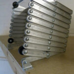 Dolle-Alufix-Vertical-Concertina-Loft-Ladder-closed-used