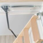 Dolle-Click-Fix-76G-Mini-Timber-Folding-Loft-Ladders-close-view-top-of-mechagnism